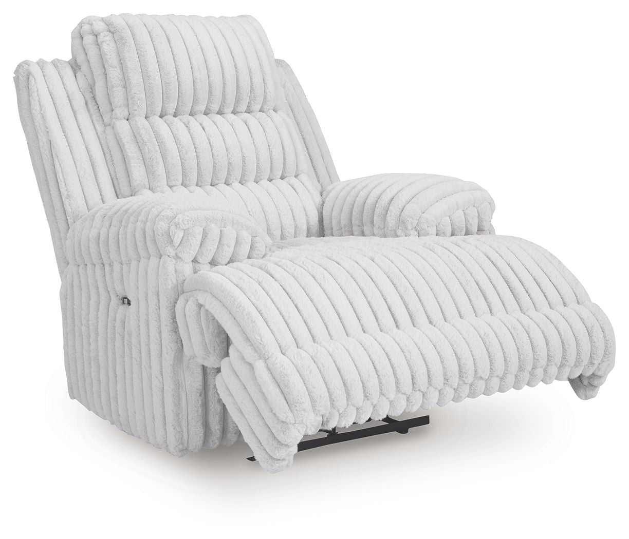 Light gray zero wall recliner with extended footrest, padded armrests, and channel tufting