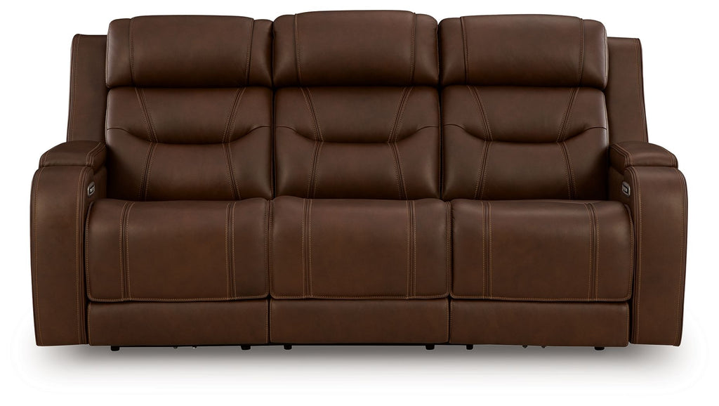 Dark brown power reclining sofa with tufted backrest and padded armrests