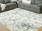 Washable rug with beige marble pattern and gray-green accents, flat weave