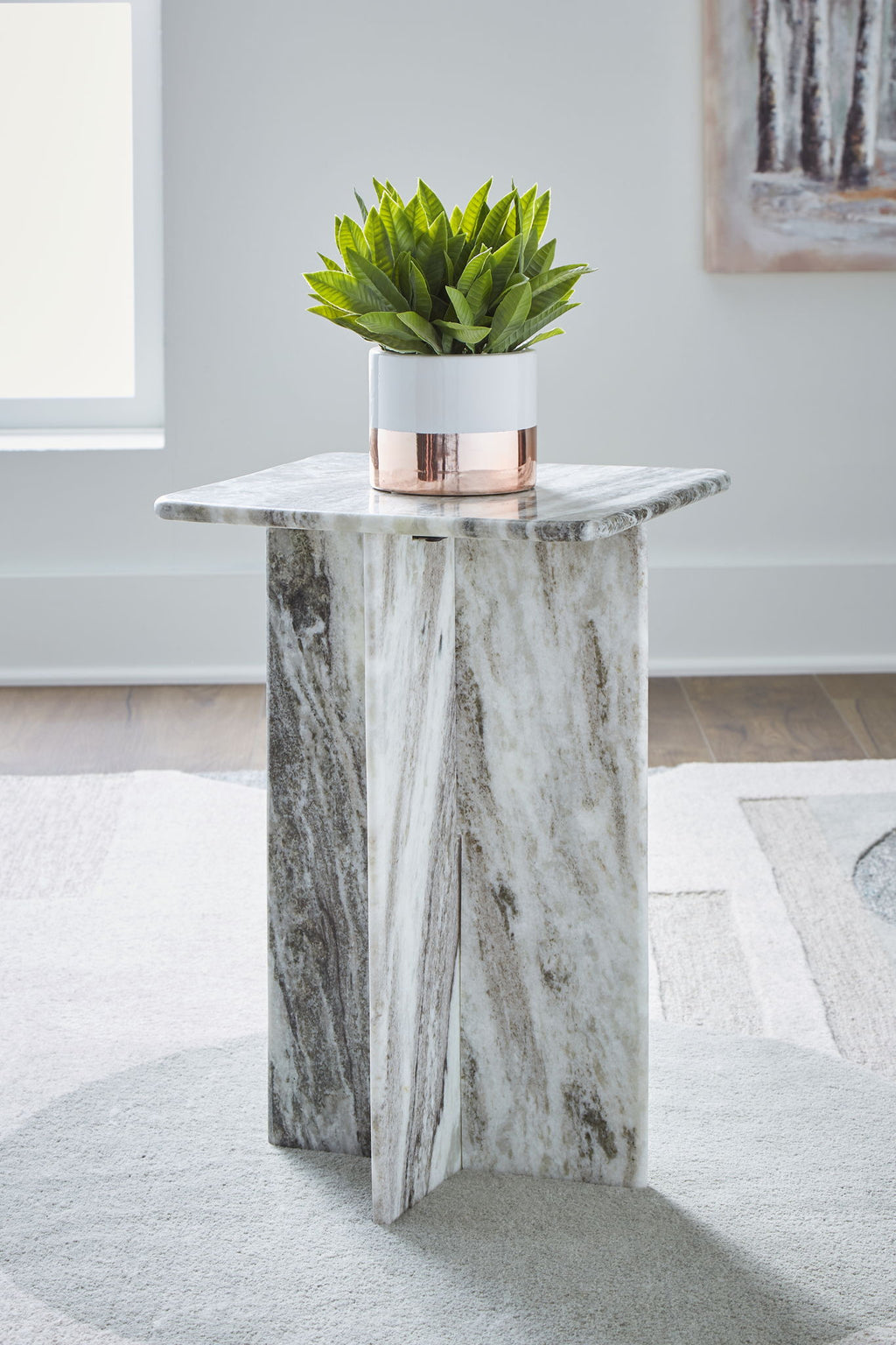 Square accent table with gray marble-look top and tapered pedestal base