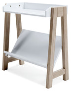 Small white bookcase with open lower shelf and light wood frame