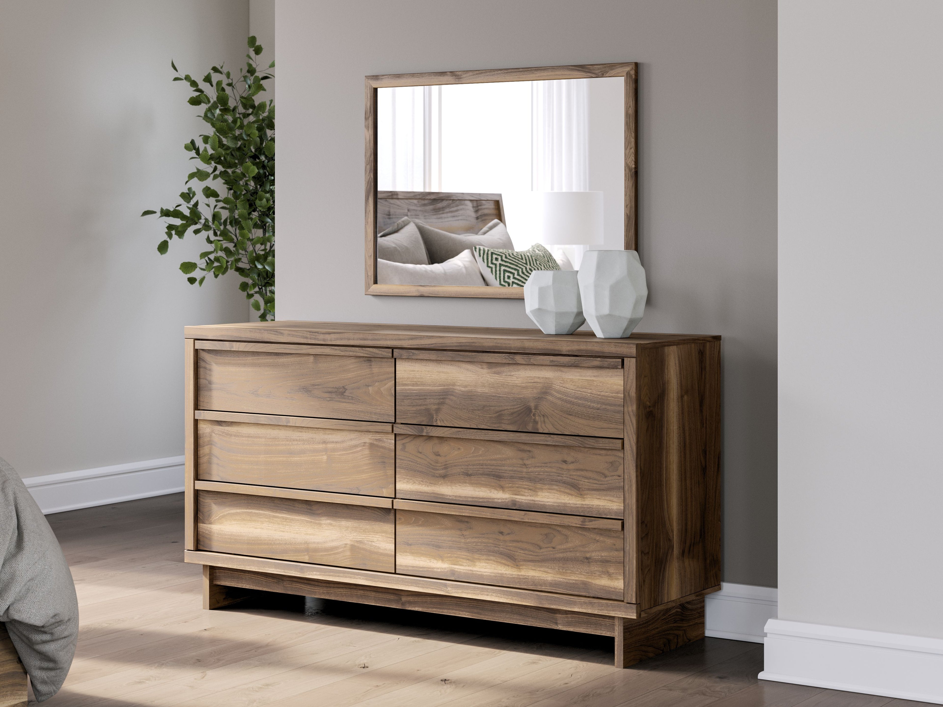 Six-drawer brown dresser with wall mirror; wood top and wide drawer fronts.