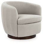 Light beige swivel accent chair with rounded arms and dark brown base