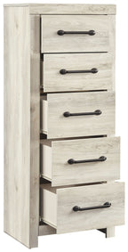 Whitewash chest of drawers with five open drawers and black bar handles, side profile