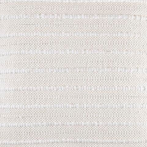Theban pillow close-up: beige woven surface with even horizontal stripe texture