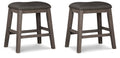 Set of 2 gray upholstered backless stools with padded round seats and wooden legs