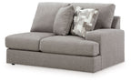 Smoke gray loveseat side view with padded arms and two seat cushions