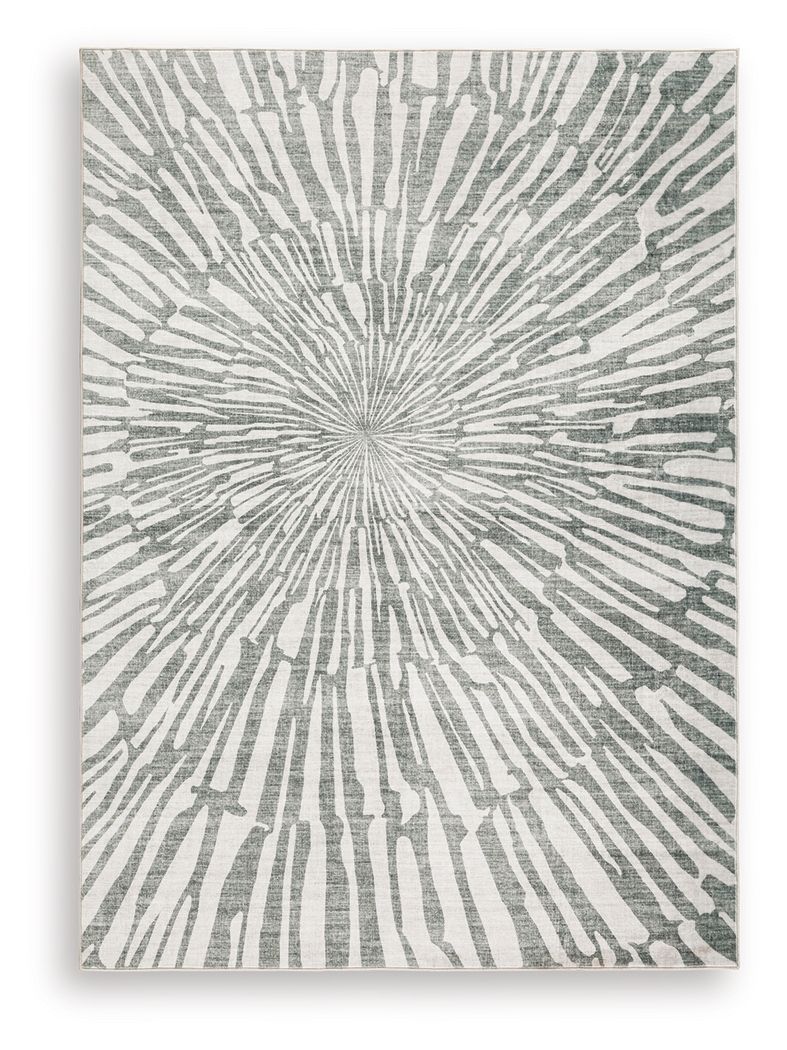 Washable rug with central radial burst pattern in gray lines on a light ground