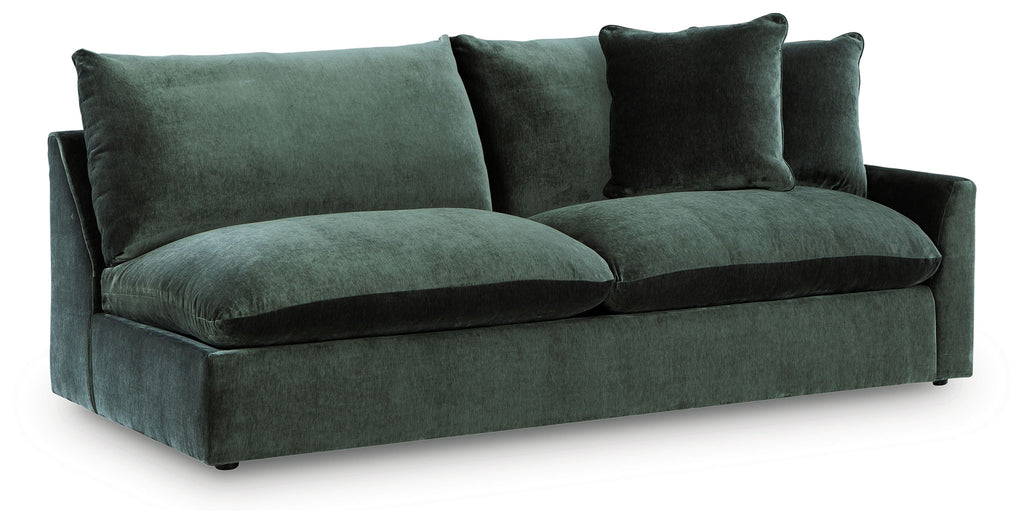 Jade green velvet sofa with two seat cushions and three back cushions, low arms