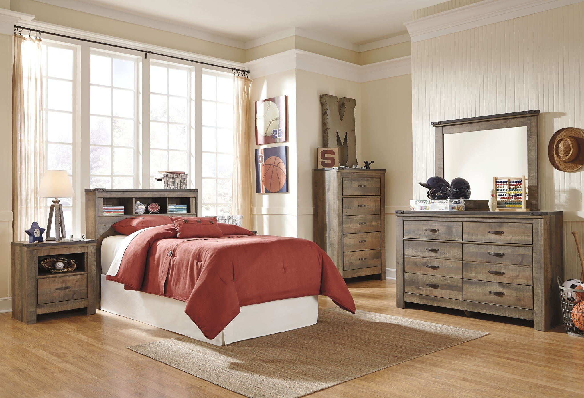Youth bookcase headboard with dark brown shelves, red comforter and pillows