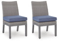 Set of 2 outdoor side chairs with blue seat cushions and gray woven backs