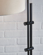 Black metal lamp pole with stacked mounts and round knobs