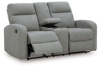 Gray double recline loveseat with one seat reclined, padded arms and headrest backs