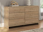 Light brown six-drawer dresser with wide drawer fronts and brushed metal bar pulls