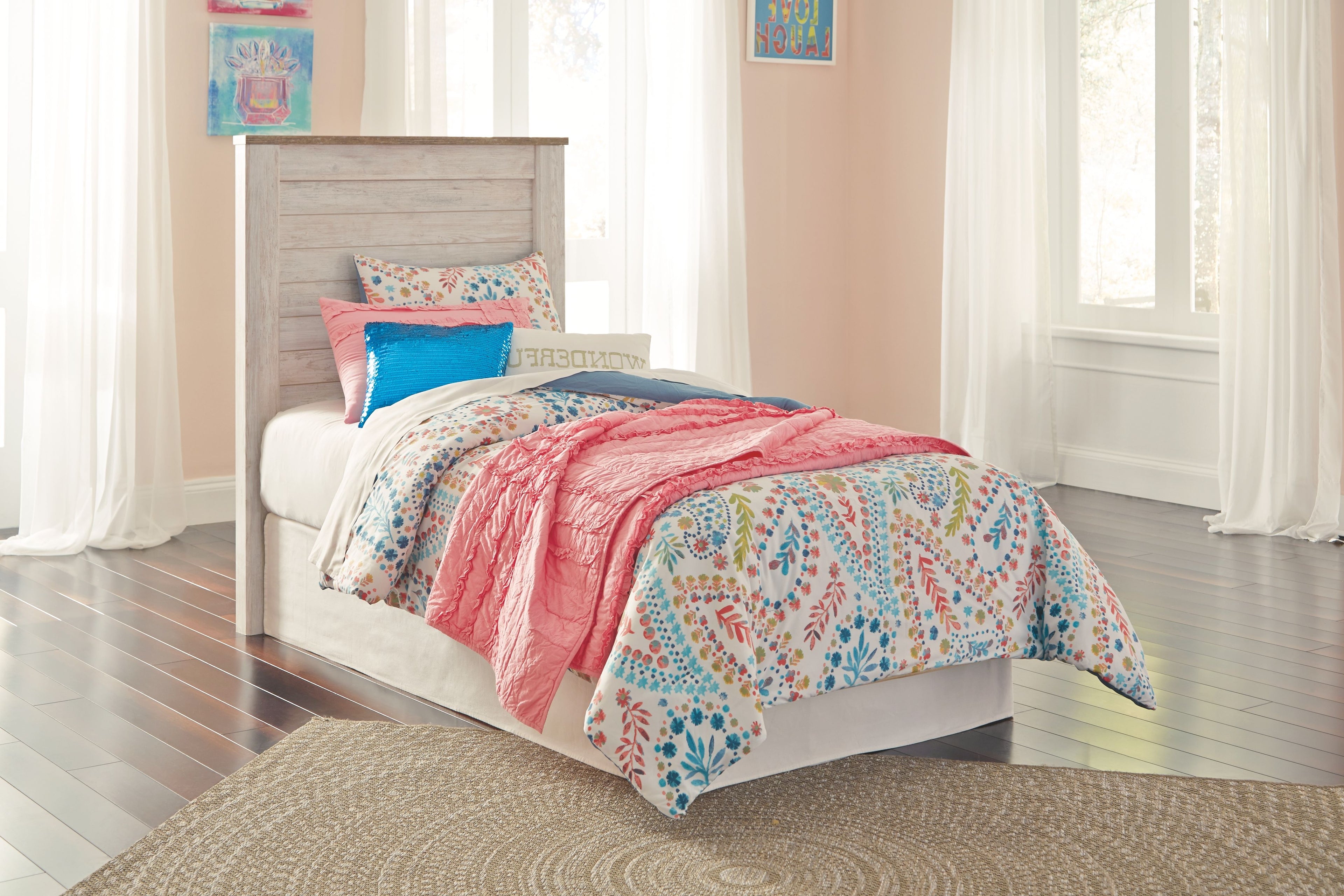Beige panel headboard bed frame with upholstered headboard and white bedding