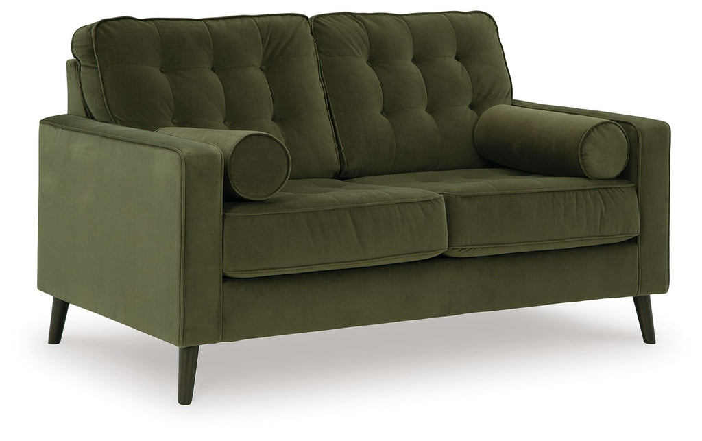 Olive green tufted loveseat with rounded arms and two bolster pillows, dark tapered legs.