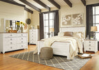Beige dresser with mirror panel and six drawers, metal knob pulls
