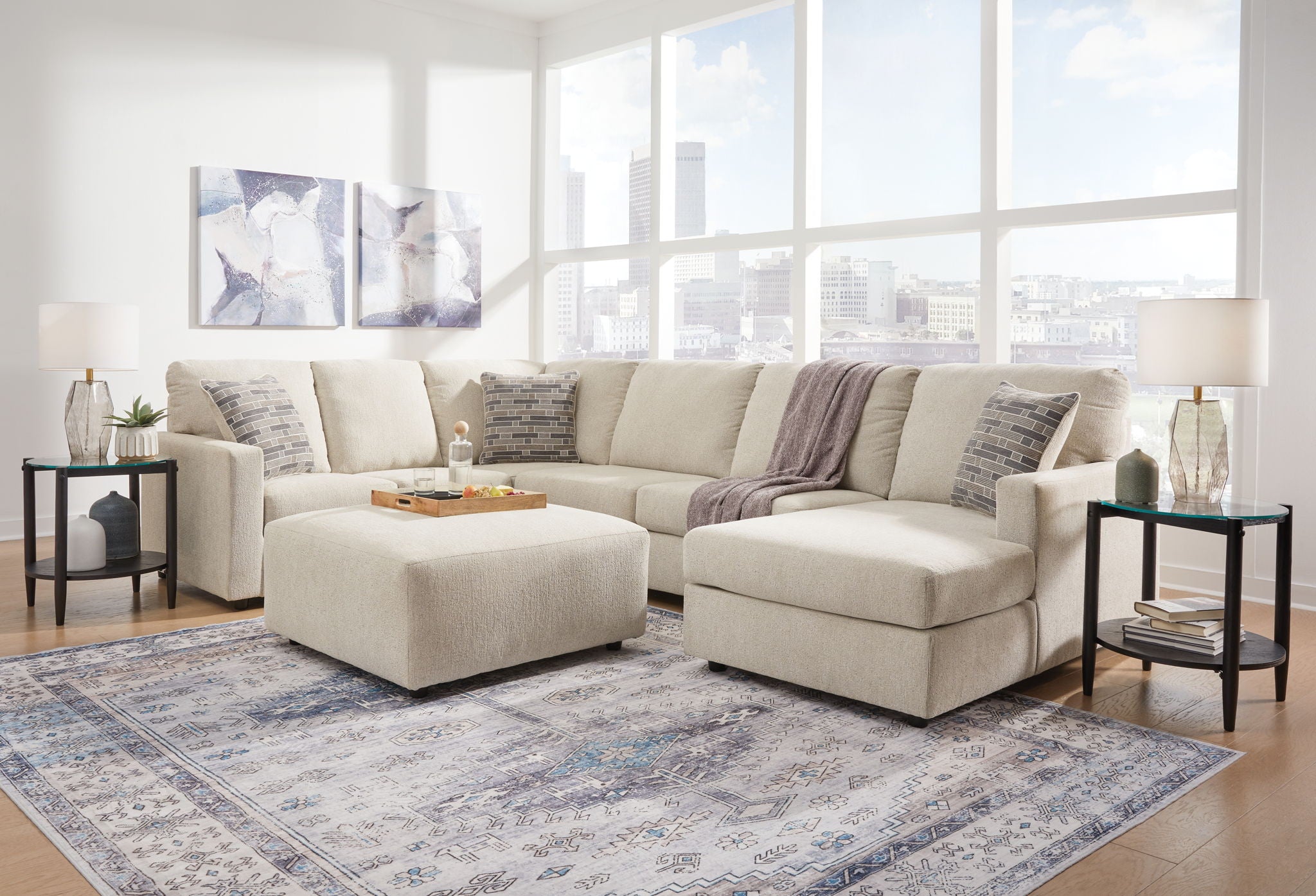 Pearl silver corner sectional sofa with chaise and ottoman, multiple cushions