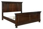 Dark brown panel bed frame with paneled headboard, low footboard, turned bun feet