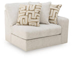 Light beige accent corner chair with tufted cushions and two geometric throw pillows