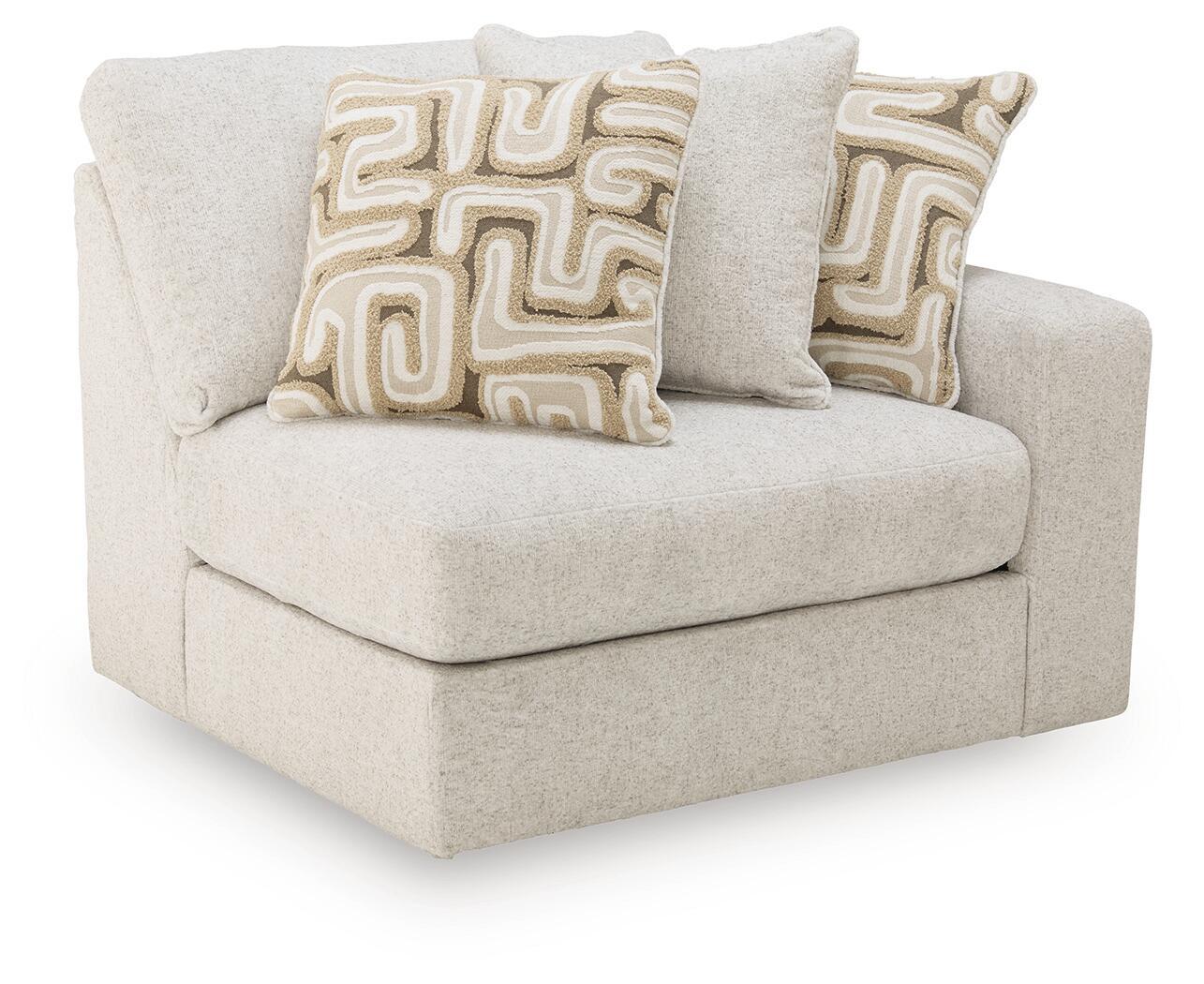 Light beige accent corner chair with tufted cushions and two geometric throw pillows