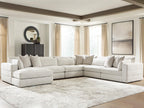 Beige sectional sofa with corner and chaise, fabric upholstery, padded seat cushions and pillows