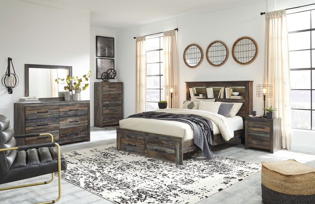 Panel bookcase bed with dark wood frame, white bedding, and side drawer storage