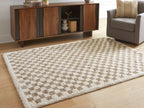 Beige rug with diamond check pattern, corner view