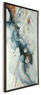 Framed abstract blue-and-white wall art with orange accents and dotted details.