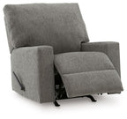 Gray rocking recliner chair with open footrest and padded armrests
