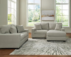 Light gray sofa set with chaise ottoman and loveseat, square arms and throw pillows