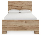 Beige storage bed with two front drawers and a white mattress and pillows