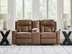Light brown double reclining loveseat with center console in a living room setting