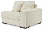 Ivory ribbed corner chair with square arms and two accent cushions