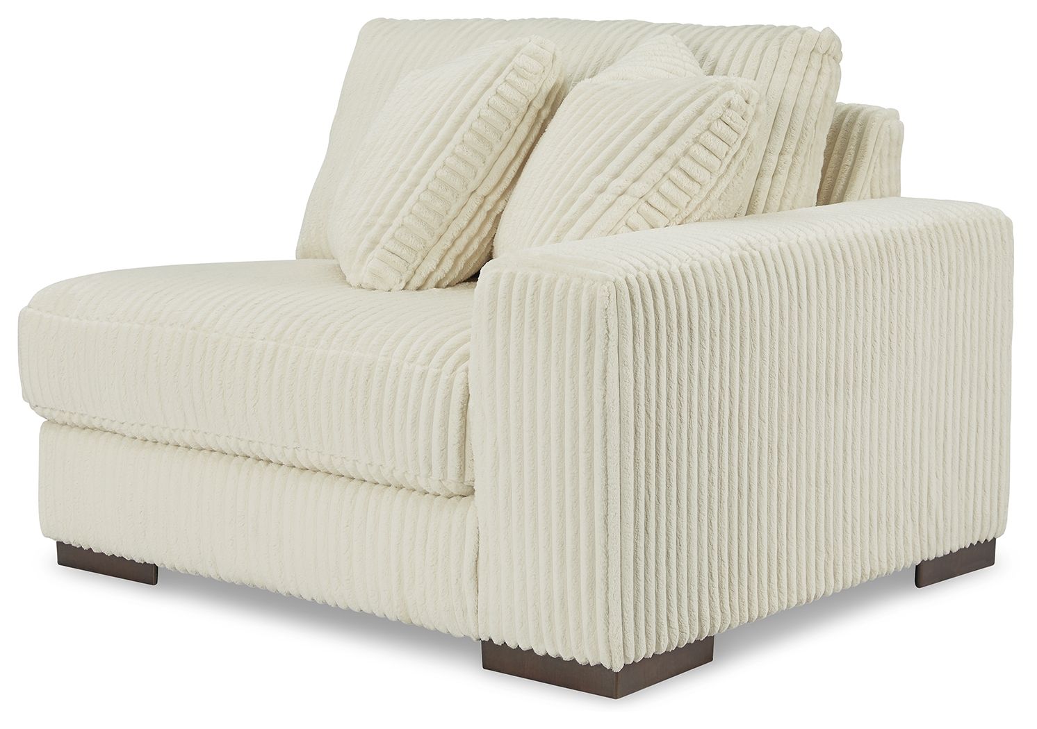 Ivory ribbed corner chair with square arms and two accent cushions