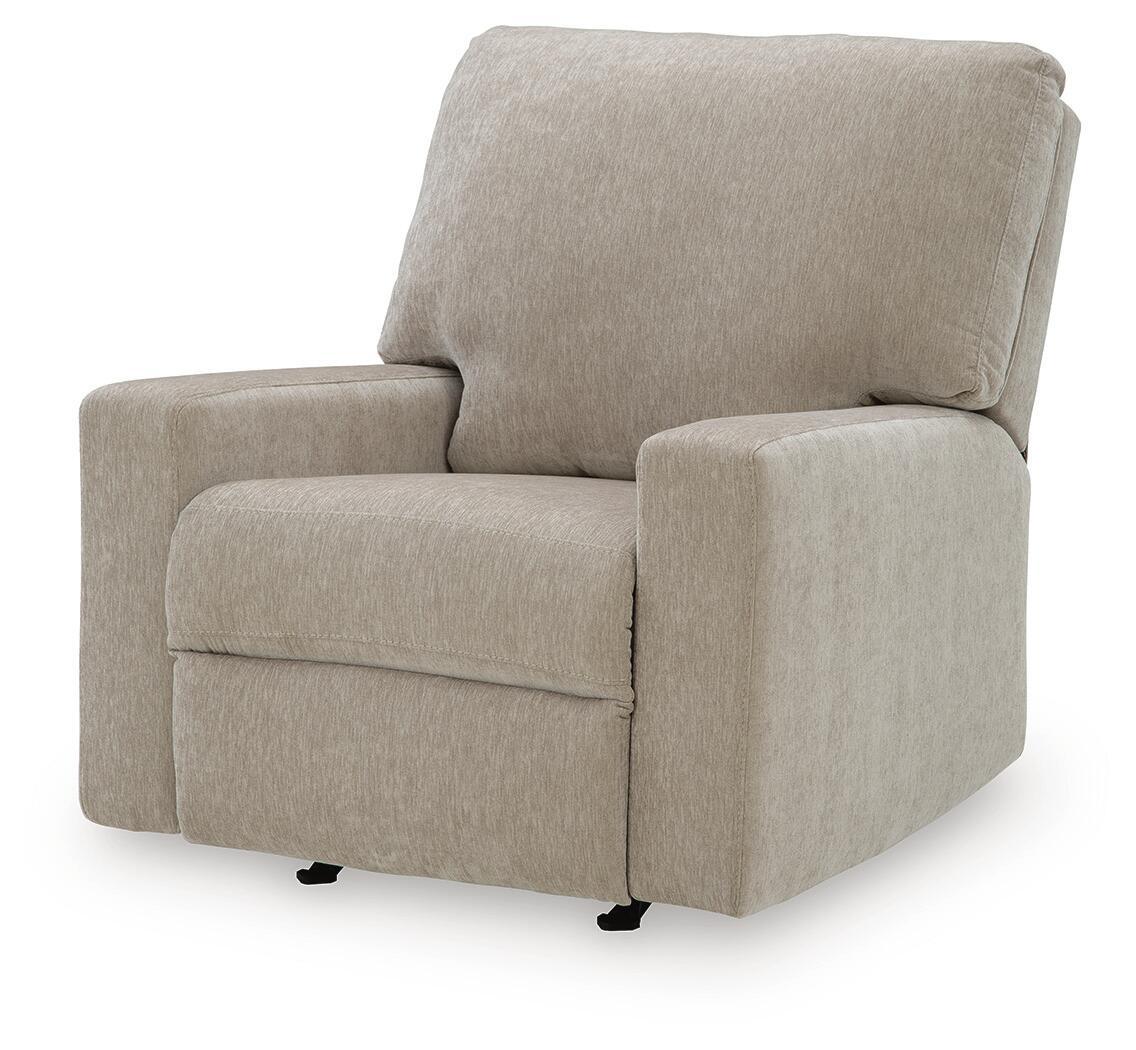 Light gray fabric rocker recliner chair with padded backrest and rounded front arms.