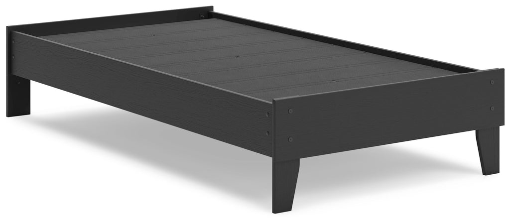 Black platform bed with low frame and slatted base