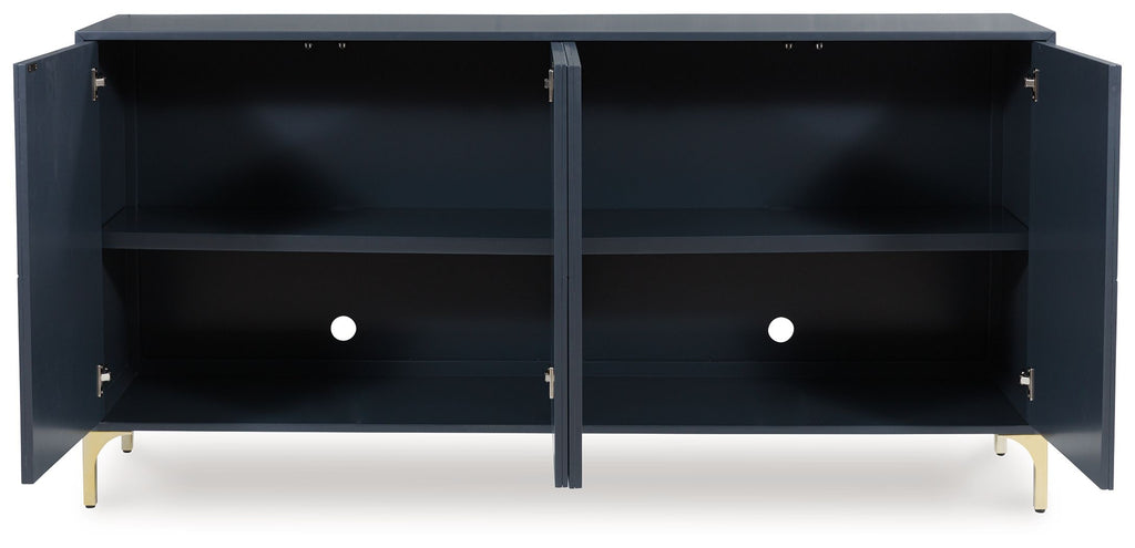 Dark blue accent cabinet with two open shelves, center divider, and gold-tone legs