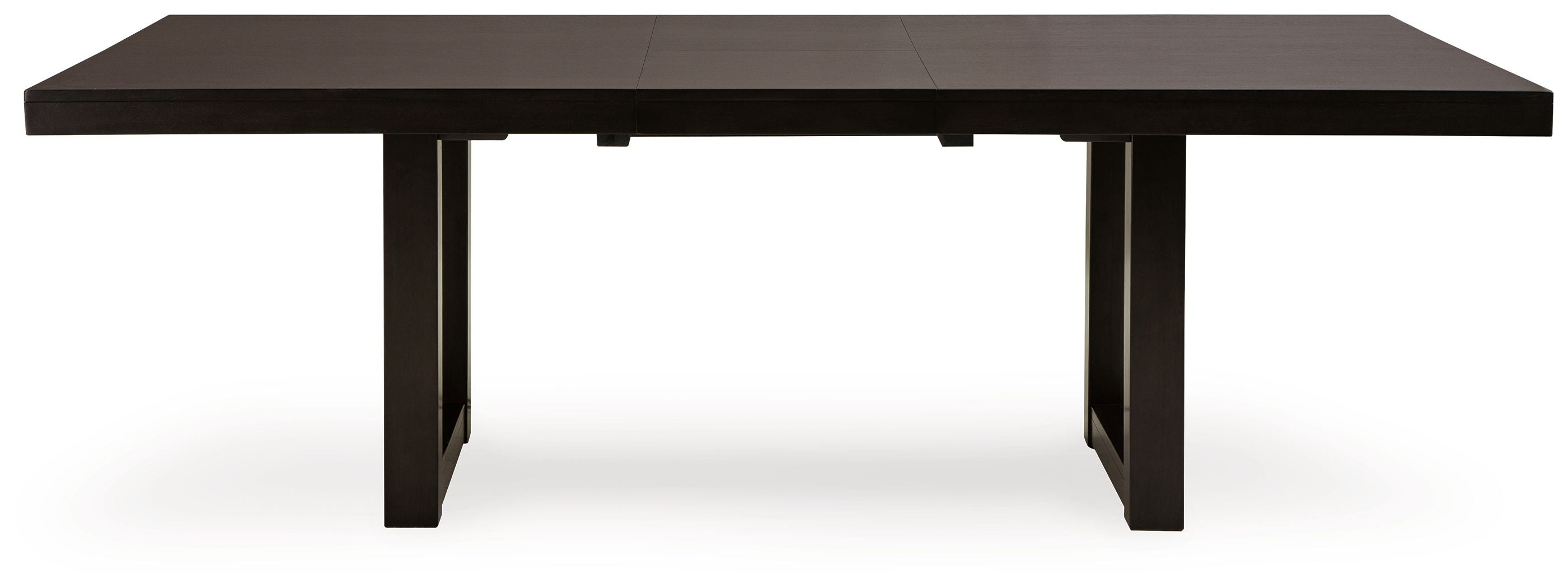 Rectangular dining table with butterfly extension seams, dark gray-brown top and straight legs.