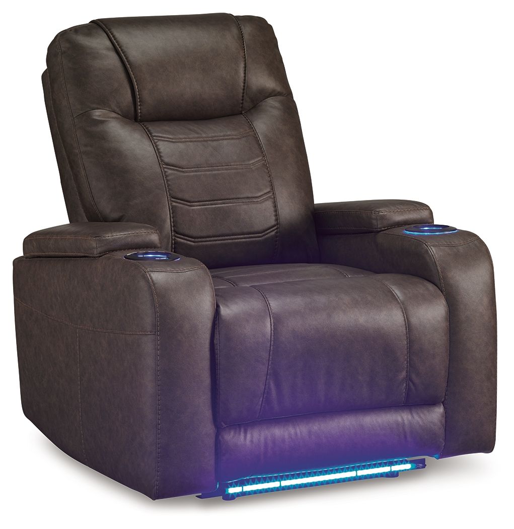 Dark brown power recliner with adjustable headrest and cup holders in padded armrests
