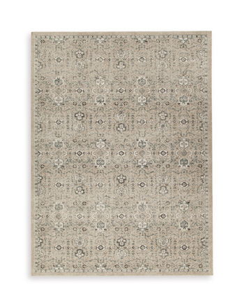 Beige area rug with all-over geometric medallion pattern, distressed look