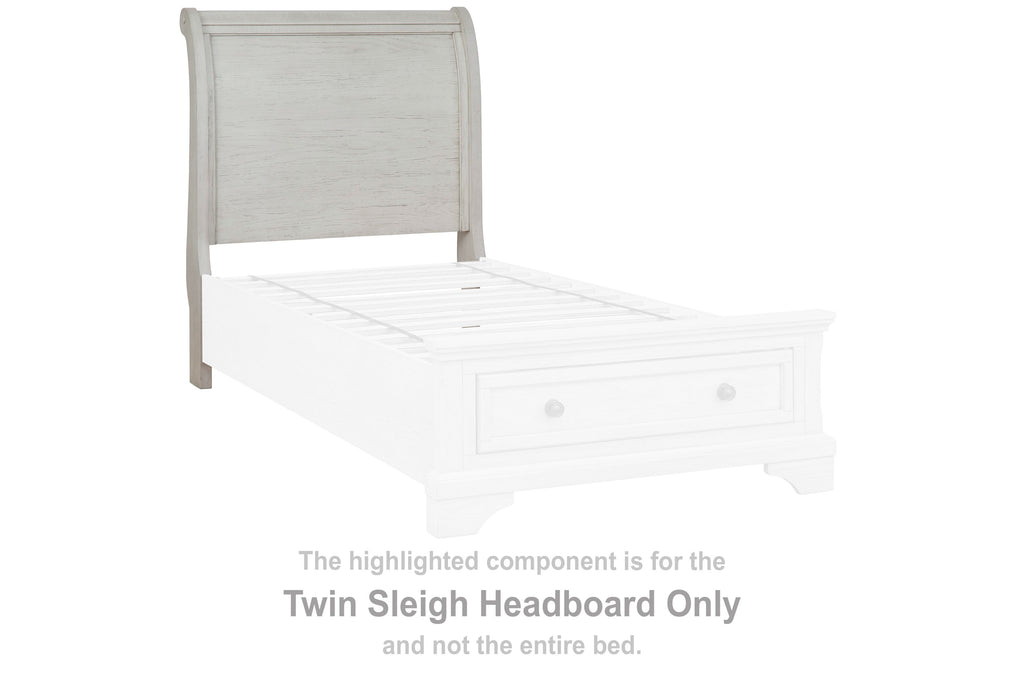 Twin sleigh headboard, antique white, with curved silhouette and padded top panel