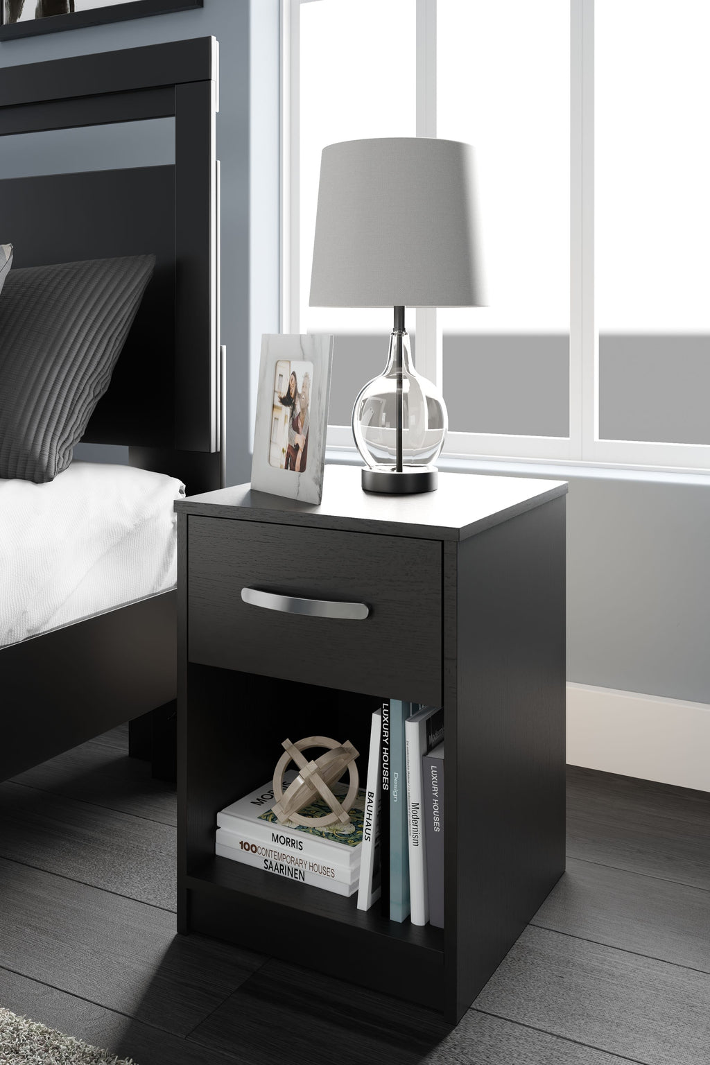 Black one-drawer night stand with open shelf and metal bar drawer handle