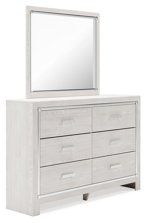White dresser with square mirror on top and multiple drawers with metal pulls