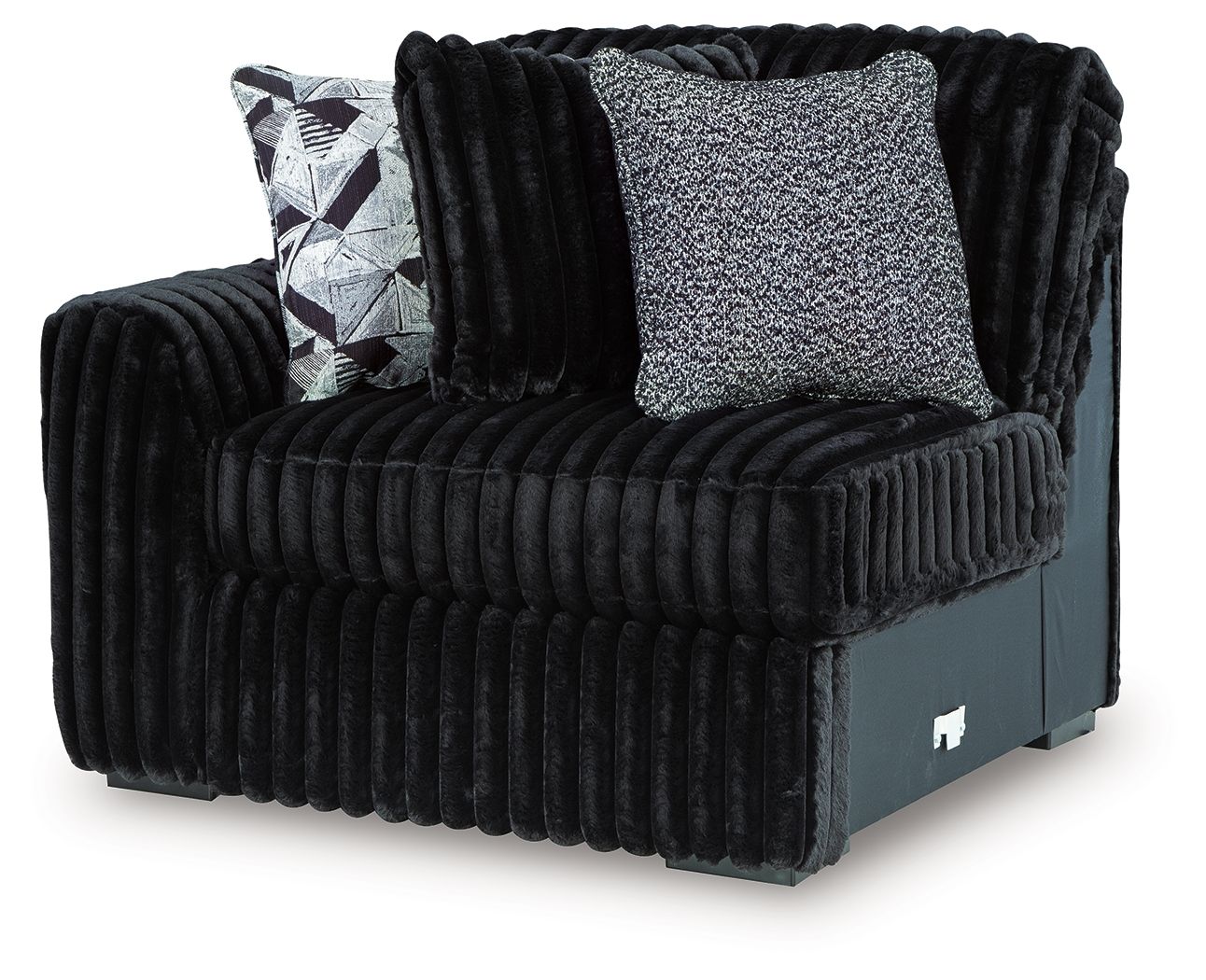 Black corduroy left-arm corner chair with textured back cushion and geometric throw pillow
