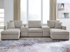 Gray sectional sofa with chaise seating and three back cushions, matching throw pillows
