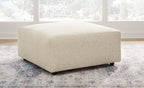 Oversized accent ottoman in light pearl silver fabric with short legs