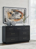 Black dresser with six drawers and metal bar pulls