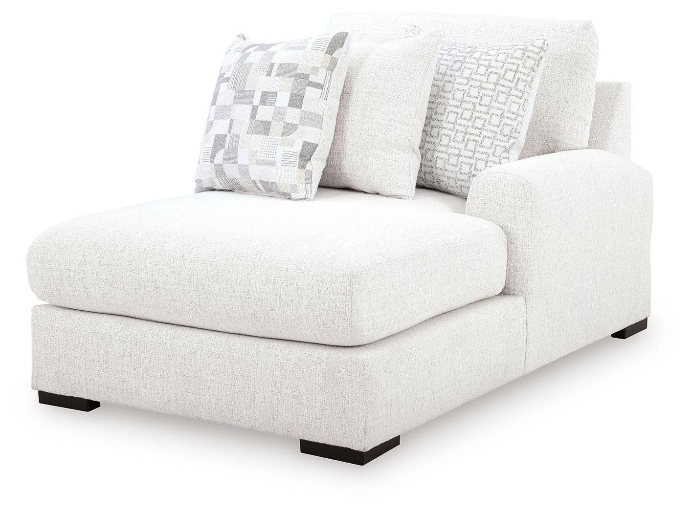 Corner chaise lounge in chalk upholstery with three cushions and black legs