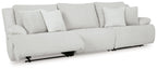 Light gray reclining sectional sofa with chaise ends and striped cushions